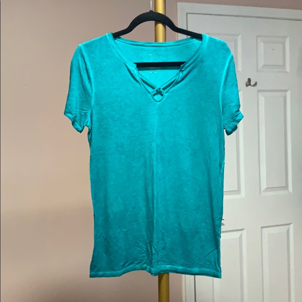 blue tee with cross ties in the front